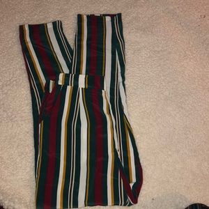 Red, green, yellow, and white striped pants